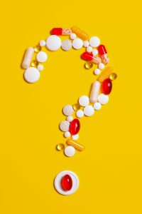 medication pills isolated on yellow background 3683098 scaled 1