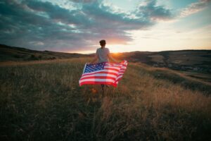 Woman with USA flag.